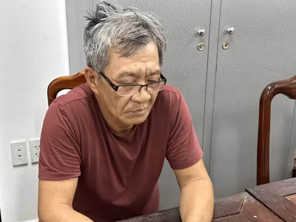 Nguyễn Đình Trung tại cơ quan Công an.