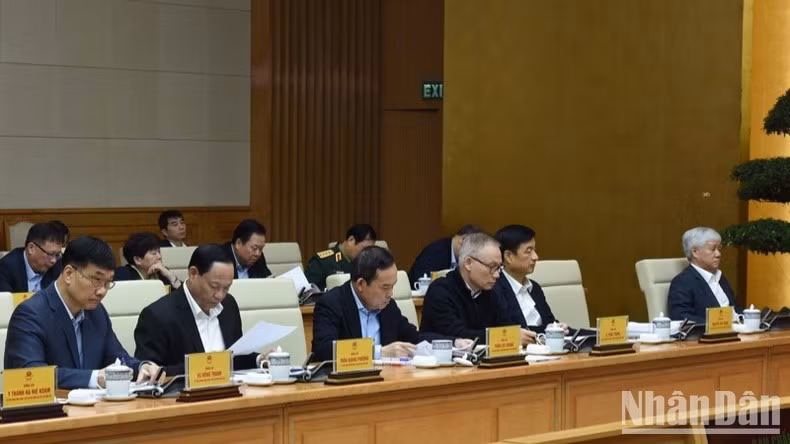 Các đại biểu tham dự cuộc làm việc. (Ảnh: TRẦN HẢI)