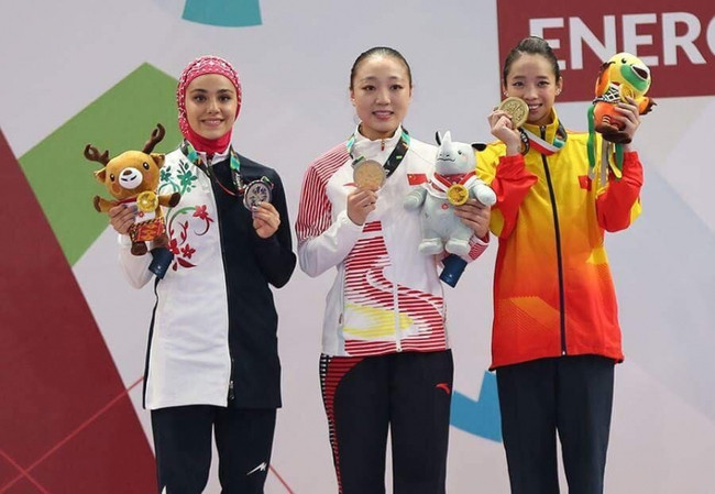 Ngọc nữ Wushu Dương Thúy Vi trở thành 'người hùng' ASIAD dù chấn thương nặng, tự tin thi đấu là có HCV - Ảnh 6. Dương Thúy Vi trở thành người hùng ASIAD dù chấn thương nặng