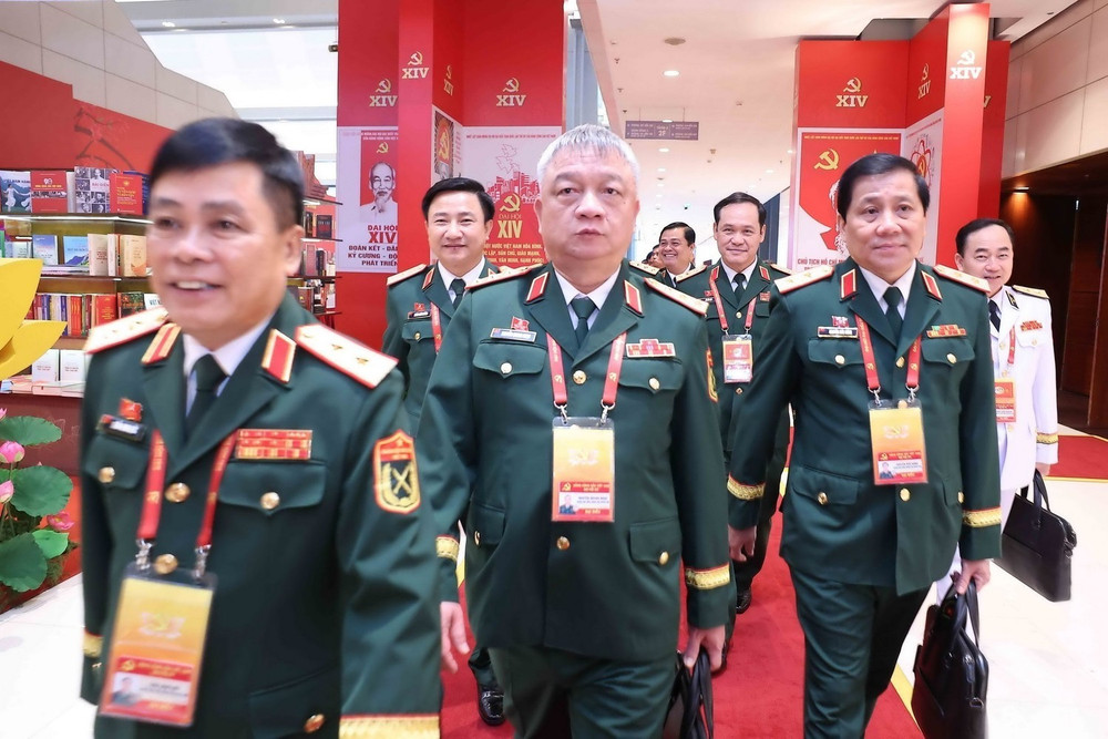 Các đại biểu đến dự phiên khai mạc Đại hội XIV của Đảng. Ảnh: TTXVN