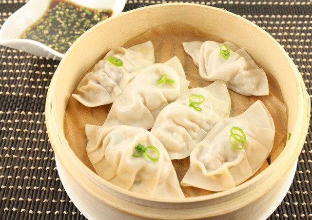 nguoi chau a thuong an gi cho may man vao dip dau nam