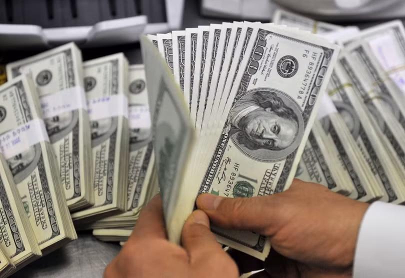 Đồng USD (Ảnh: AFP/TTXVN)