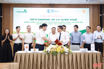 Vietcombank ký kết đồng hành hỗ trợ hộ kinh doanh vững bước chuyển đổi