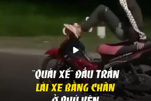 "Quái xế" đầu trần chạy xe bằng 2 chân