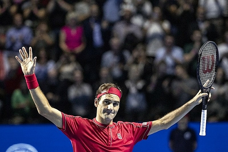 Federer muốn nghỉ ngơi sau khi vô địch ATP Swiss Indoors ở Basel. Ảnh: AP. Federer rút lui khỏi Paris Masters