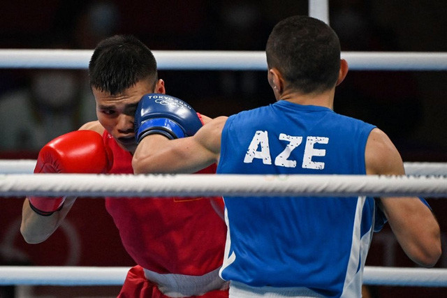 Nguyễn Văn Đương lập kỳ tích cho Boxing Việt Nam ở Olympic sau 33 năm - Ảnh 2. Nguyễn Văn Đương lập kỳ tích cho Boxing Việt Nam ở Olympic sau 33 năm
