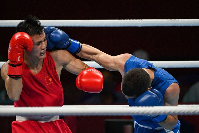 Nguyễn Văn Đương lập kỳ tích cho Boxing Việt Nam ở Olympic sau 33 năm - Ảnh 3. Nguyễn Văn Đương lập kỳ tích cho Boxing Việt Nam ở Olympic sau 33 năm