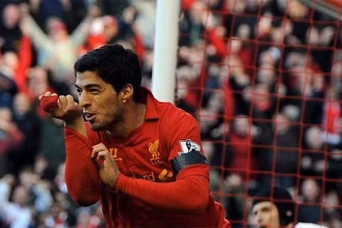 Suarez ăn mừng bàn thắng ấn định tỷ số trận đấu. Ảnh: Getty.