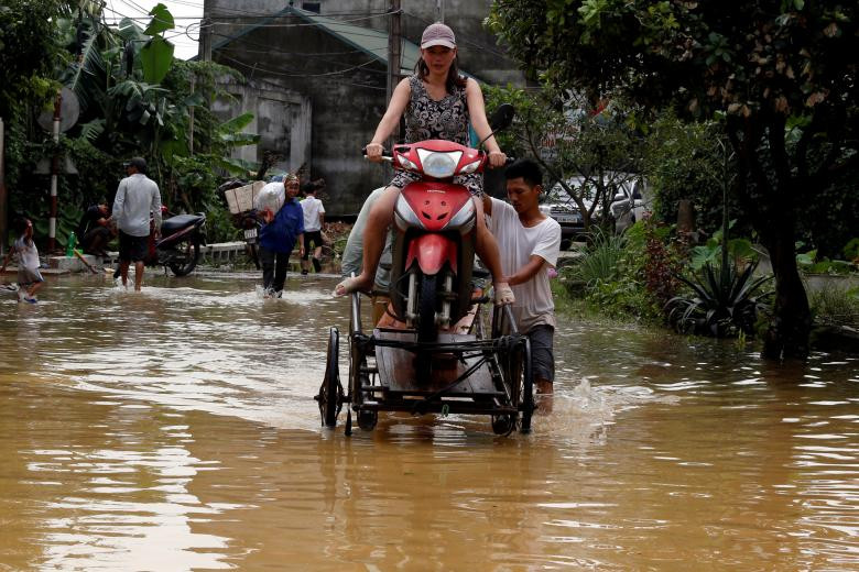 photo mua lu o viet nam qua ong kinh nhiep anh gia reuters