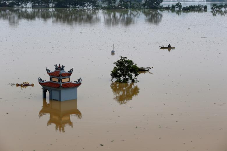 photo mua lu o viet nam qua ong kinh nhiep anh gia reuters