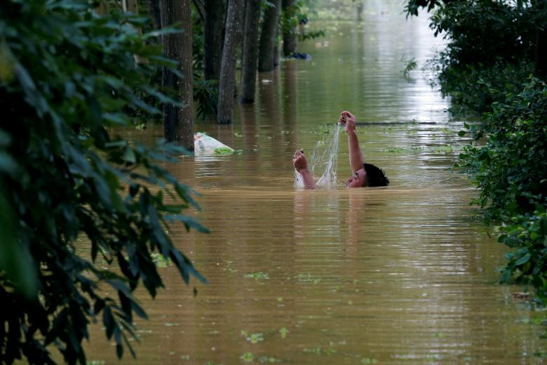 photo mua lu o viet nam qua ong kinh nhiep anh gia reuters