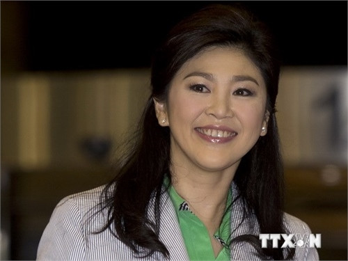 Cựu Thủ tướng Thái Lan Yingluck Shinawatra tới sân bay quốc tế Suvarnabhumi ở Bangkok ngày 23/7 vừa qua. (Ảnh: AFP/TTXVN)