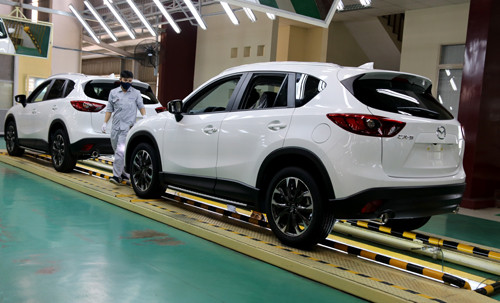 Nghị định 116 mở ra cơ hội bùng nổ cho những xe lắp ráp như CX-5. nhap khau hay lap rap tran chien sinh tu thi truong oto viet