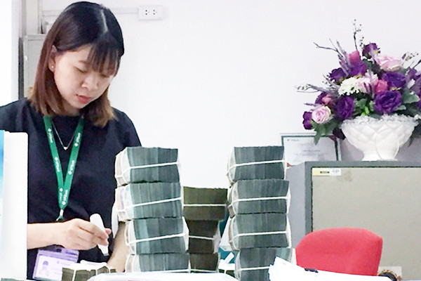 Thưởng Tết năm 2018 được nhận định ở mức khả quan hơn so với năm 2017 - Ảnh: Tạ Tôn nganh nao thuong tet 2018 cao