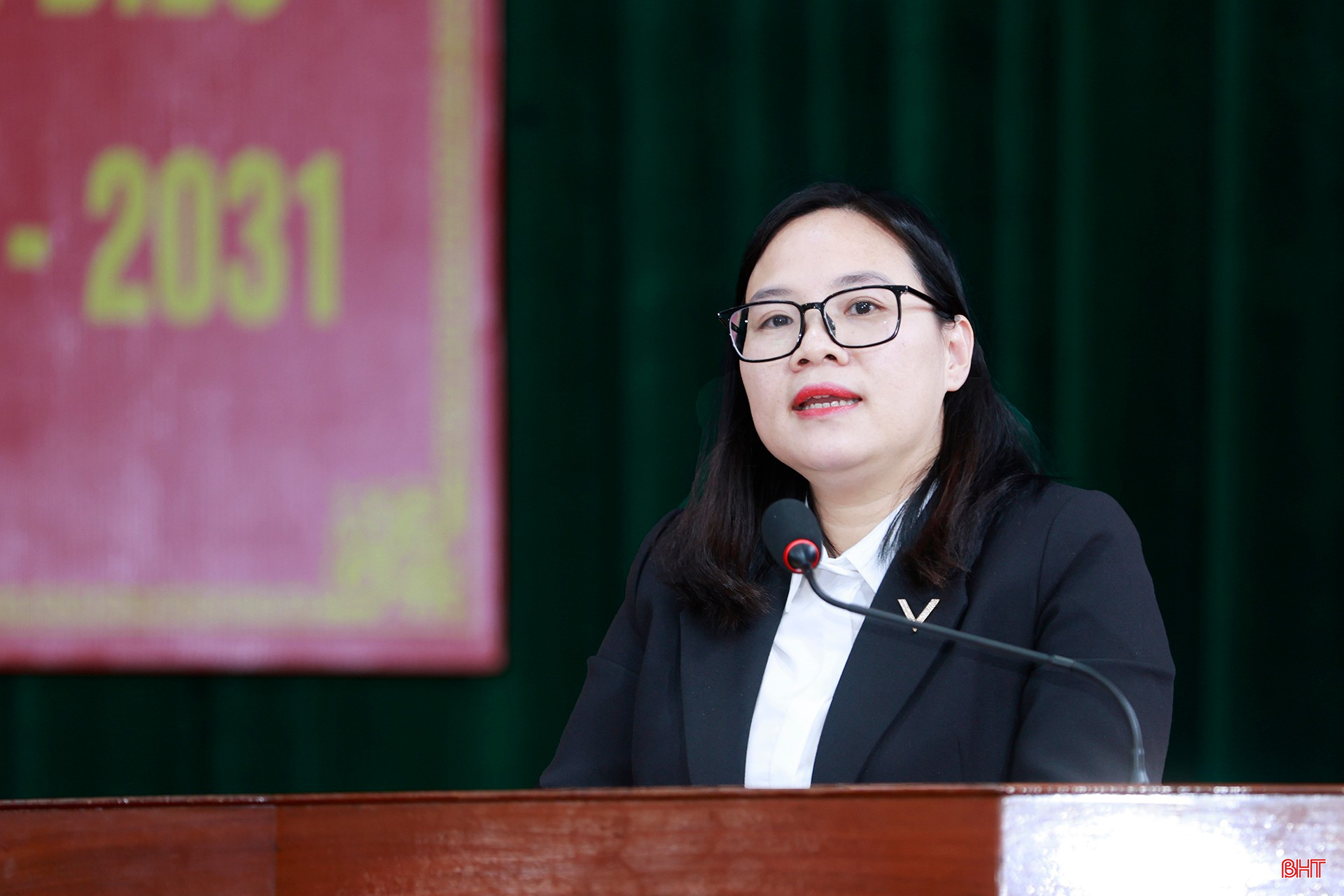 Bà Đinh Thị Hiền - Trưởng phòng Nghiệp vụ, Trung tâm Trợ giúp pháp lý, Sở Tư pháp trình bày chương trình hành động.