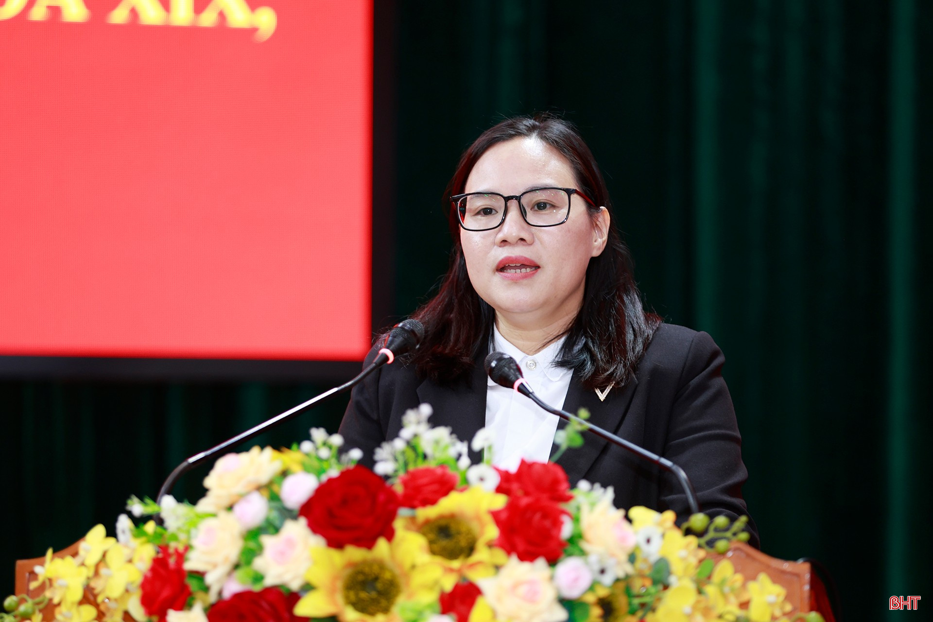 Bà Đinh Thị Hiền - Trưởng phòng Nghiệp vụ, Trung tâm Trợ giúp pháp lý, Sở Tư pháp trình bày chương trình hành động.