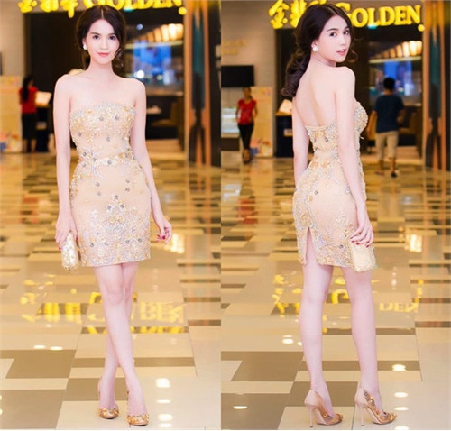 Ngọc Trinh thu hút chú ý tại sự kiện thời trang tối 7/11 khi diện váy quây gợi cảm, đính kết công phu của stylist Đỗ Long. Thiết kế này giúp người đẹp khoe khéo vai trần và đôi chân thon dài. Bên cạnh đó, chiếc ví cầm tay cùng đôi giày ăn ý càng khiến phong cách nữ diễn viên Vòng eo 56 thêm hoàn hảo. Tổng thể style sành điệu thu về 1.016 phiếu vote.