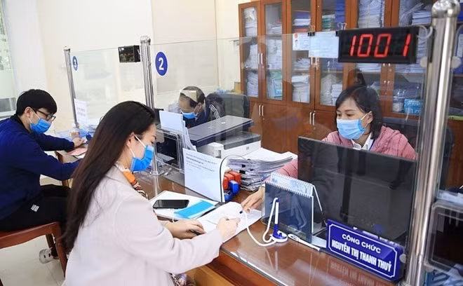 Bỏ cấp huyện, sáp nhập xã sẽ dôi dư nhiều nhân sự Ảnh minh họa: Nguyễn Quang