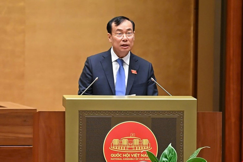 Chủ nhiệm Ủy ban Quốc phòng An ninh Lê Tấn Tới báo cáo trước Quốc hội (Ảnh: Media Quốc hội). a1.jpg