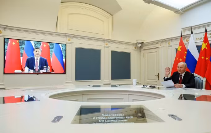 Chủ tịch Trung Quốc Tập Cận Bình và Tổng thống Nga Vladimir Putin hội đàm trực tuyến ngày 4/2. Ảnh: Reuters