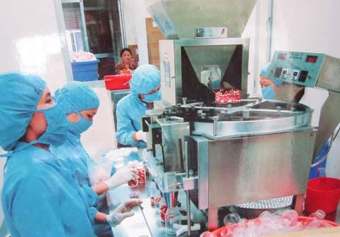 Sản xuất thuốc trên máy đóng chai tự động