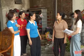 Nữ trưởng thôn vượt lên nghịch cảnh 
