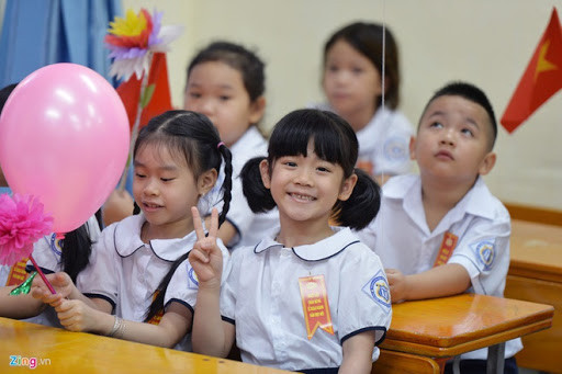 Bắt đầu từ 1/7, học sinh tiểu học không phải đóng học phí