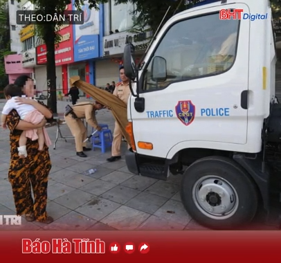 Đại úy CSGT dùng ô tô đặc chủng, kịp thời đưa cháu bé bị sốt cao đi cấp cứu