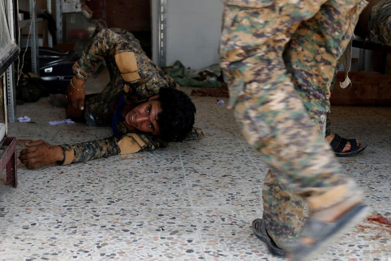 photo ben trong mot benh vien da chien o syria