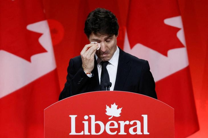 Ông Trudeau xúc động khi phát biểu trong ngày bỏ phiếu chọn thủ tướng mới hôm 9-3 - Ảnh: REUTERS Ông Trudeau xúc động khi phát biểu trong ngày bỏ phiếu chọn thủ tướng mới hôm 9-3 - Ảnh: REUTERS