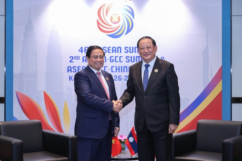 Thủ tướng Phạm Minh Chính và Thủ tướng Lào Sonexay Siphandone - Ảnh: VGP/Nhật Bắc