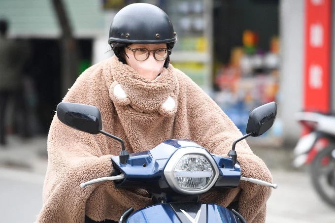 Người Hà Nội trong rét tháng 1/2024. Ảnh: Giang Huy