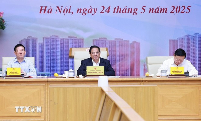 Thủ tướng Phạm Minh Chính chủ trì cuộc làm việc về tình hình thị trường vàng. (Ảnh: Dương Giang/TTXVN) Thủ tướng Phạm Minh Chính chủ trì cuộc làm việc về tình hình thị trường vàng. (Ảnh: Dương Giang/TTXVN)