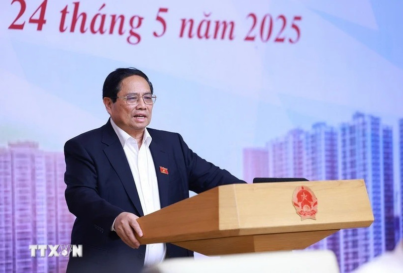 Thủ tướng Phạm Minh Chính chủ trì cuộc làm việc của Thường trực Chính phủ với các bộ, ngành, chuyên gia, ngân hàng về tình hình thị trường vàng. (Ảnh: Dương Giang/TTXVN). ttxvn-2405-thu-tuong-thi-truong.jpg