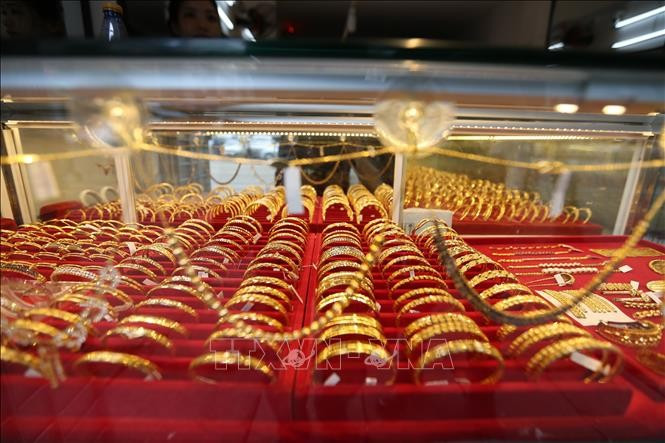 Giá vàng thế giới nhích lên giữa áp lực từ đồng USD mạnh. Ảnh minh hoạ