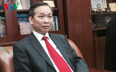 Phó Thống đốc NHNN Đào Minh Tú. thong tin doi tien la hoan toan bia dat