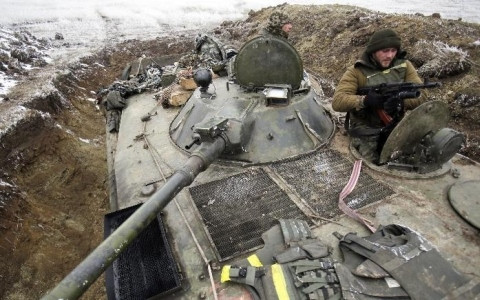 Thỏa thuận ngừng bắn tại miền Đông Ukraine vẫn ở trên giấy tờ ảnh 1