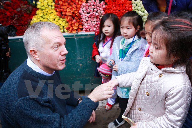 di cho hoa quang an dai su my tam su ke hoach nghi tet nguyen dan