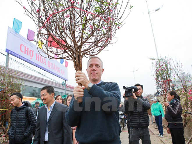 di cho hoa quang an dai su my tam su ke hoach nghi tet nguyen dan