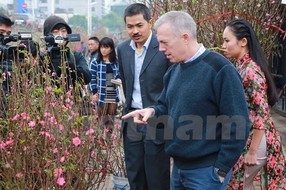 di cho hoa quang an dai su my tam su ke hoach nghi tet nguyen dan