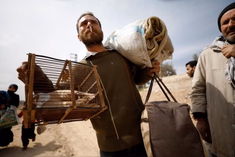 hinh anh nguoi dan syria lu luot so tan khoi vung chien su dong ghouta