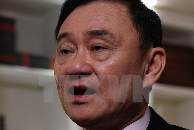 cuu thu tuong thai lan thaksin bi buoc toi lang ma hoang gia