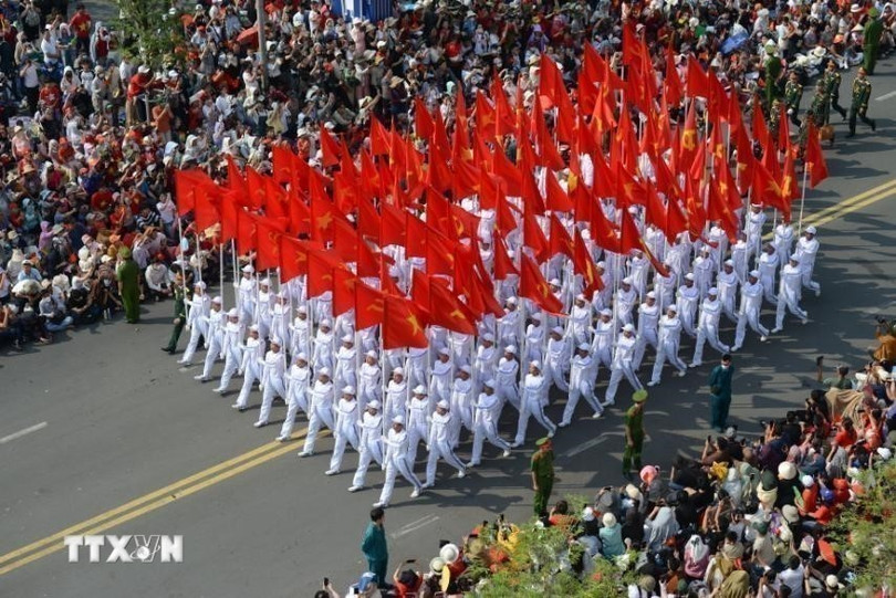 Khối cờ Đảng, cờ Tổ quốc diễu hành tại Lễ kỷ niệm 50 năm Ngày Giải phóng miền Nam, thống nhất đất nước (30/4/1975 – 30/4/2025). ttxvn-hinh-anh-an-tuong-tai-le-dieu-binh-dieu-hanh-ky-niem-50-nam-ngay-giai-phong-mien-nam-8.jpg