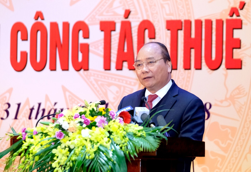 Thủ tướng Nguyễn Xuân Phúc phát biểu tại Hội nghị. Ảnh: VGP/Quang Hiếu thu tuong nganh thue phai dep bo ngay tinh trang boi tron