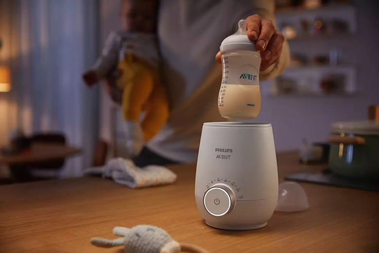 Bạn có thể sử dụng máy hâm sữa để hâm nóng sữa sau khi đã rã đông ở ngăn mát tủ lạnh Bạn có thể sử dụng máy hâm sữa để hâm nóng sữa sau khi đã rã đông ở ngăn mát tủ lạnh