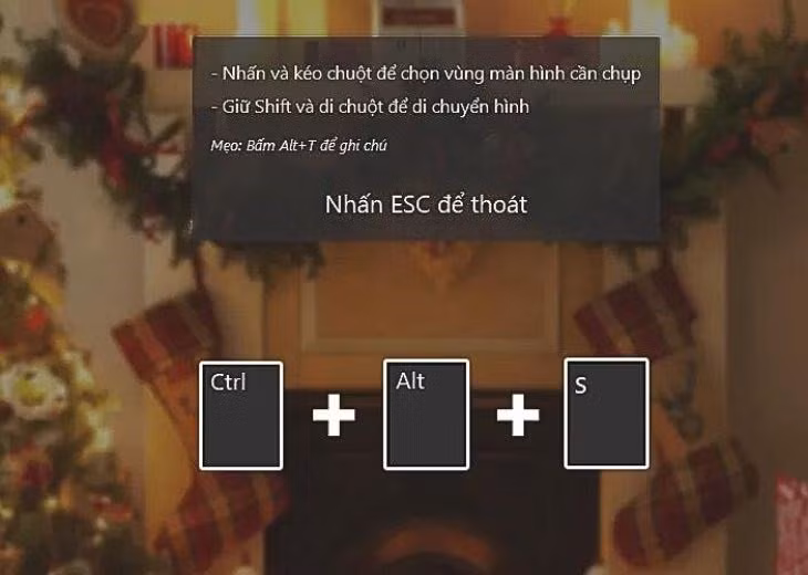 Bạn nhấn giữ tổ hợp phím Ctrl + Alt + S và giữ shift để kéo thả chuột và chụp hình.