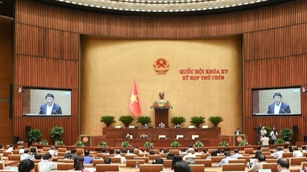 Quốc hội làm việc tại hội trường nghe Tờ trình và Báo cáo thẩm tra dự án Luật sửa đổi, bổ sung một số điều của Bộ luật Hình sự. (Ảnh: BÙI GIANG) qh-20-1925-1468-2277-8893.jpg