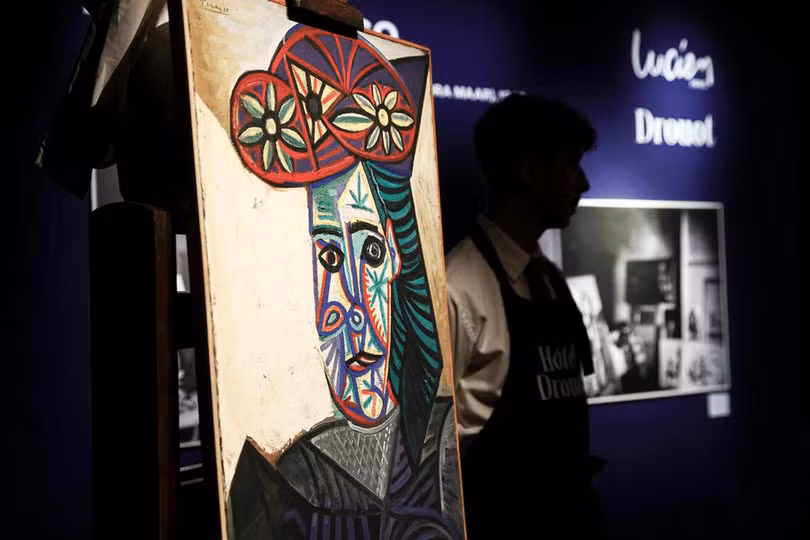 Bức tranh mang tên Bust Of A Woman With A Flowery Hat (Tượng bán thân người phụ nữ đội mũ hoa) của danh họa người Tây Ban Nha Pablo Picasso khắc họa chân dung nhiếp ảnh gia người Pháp Dora Maar, nàng thơ nổi tiếng nhất của ông. Ảnh: EPA