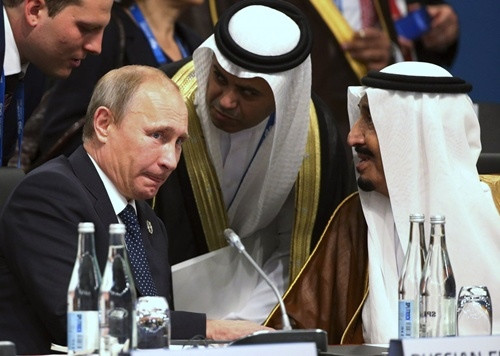 Tổng thống Nga Vladimir Putin và hoàng tử Ảrập - Salman bin Abdulaziz Al Saud. Ảnh: Reuters
