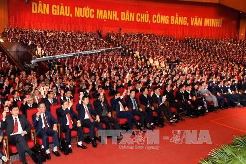 Các đại biểu biểu quyết thông qua Quy chế làm việc của Đại hội. Ảnh: TTXVN